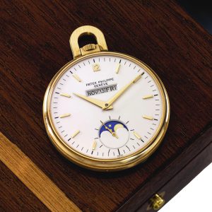 Swiss 18K gold lever with linear calendar and moon phases Circa 1981