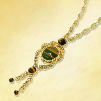 Elegant Swiss 18K gold and tiger's eye necklace watch Circa 1974