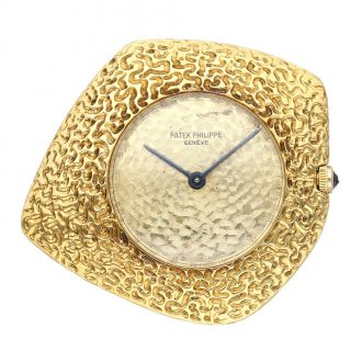 Unusual Swiss 18K gold asymmetrical lever watch Circa 1967