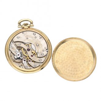 Swiss 14 carat gold open faced keyless pocket watch Circa 1925