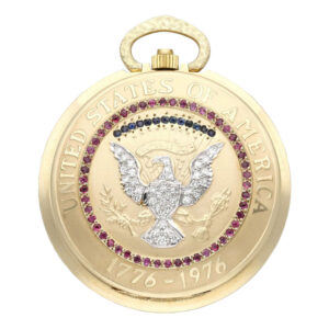 Swiss 14K gold, diamond, ruby and sapphire set watch Circa 1976