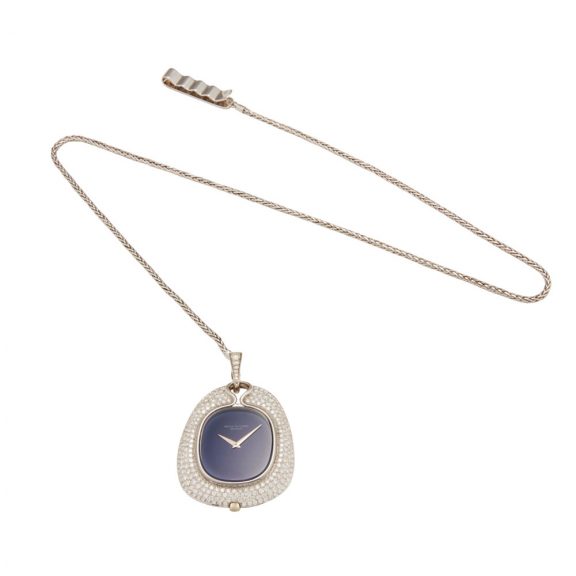 Swiss 18K white gold and diamond set watch with chain Circa 1976