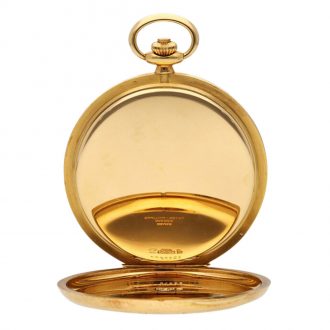 Unique Swiss 18K gold and enamel keyless lever watch Circa 1996 Unique Swiss 18K gold and enamel keyless lever watch Circa 1996