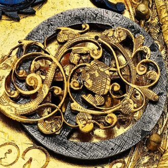 The front back of this early gilt-metal astronomical verge watch circa 1618