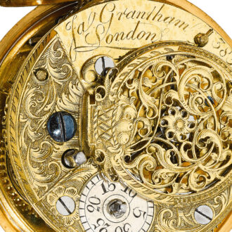 An English gold verge with high relief repousse scene Circa 1761