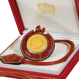 French gold watch with red leather covered case Circa 1950 French gold watch with red leather covered case Circa 1950