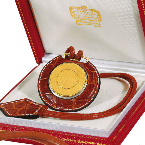 French gold watch with red leather covered case Circa 1950 French gold watch with red leather covered case Circa 1950