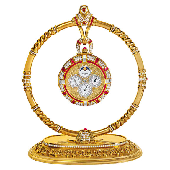 Exceptional Swiss gold watch with display stand Circa 1994