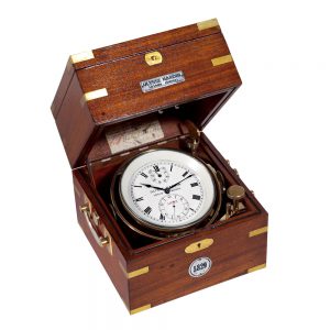 Swiss brass chronometer watch in mahogany box Circa 1930
