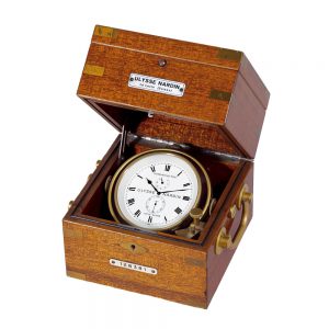 Swiss brass open faced watch in mahogany box Circa 1950