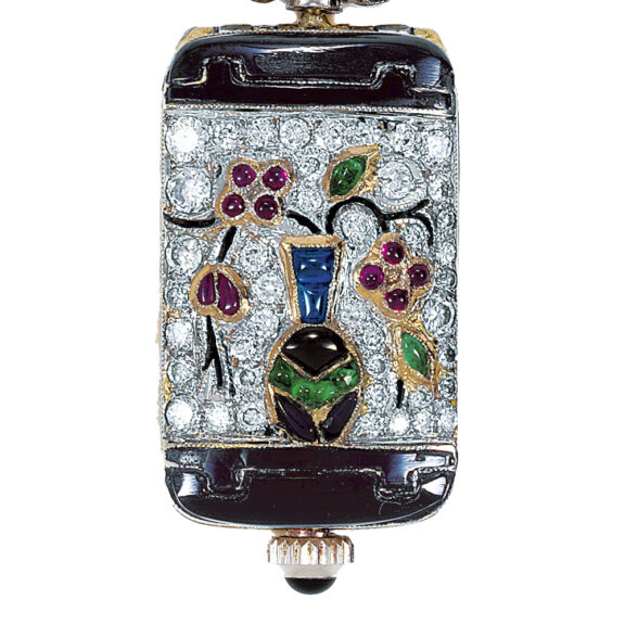 Elegant Swiss decorated white gold lady's lapel watch Circa 1925 Elegant Swiss decorated white gold lady's lapel watch Circa 1925