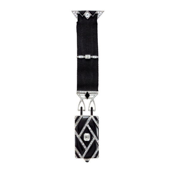 Swiss platinum, black onyx and diamond-set lapel watch Circa 1925