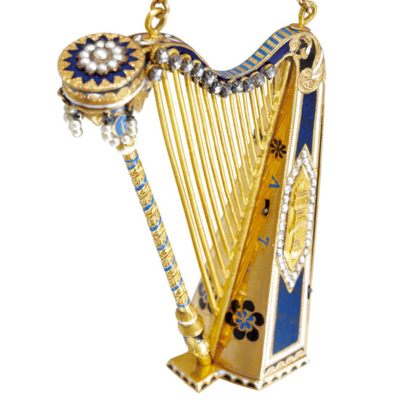 Rare Swiss 18k gold musical watch in the form of a harp Circa 1810 Rare Swiss 18k gold musical watch in the form of a harp Circa 1810