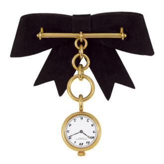 Swiss gold lapel quartz watch with chain and brooch Circa 1989