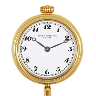 Swiss gold lapel quartz watch with chain and brooch Circa 1989 Swiss gold lapel quartz watch with chain and brooch Circa 1989