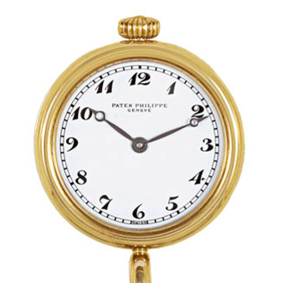 Swiss gold lapel quartz watch with chain and brooch Circa 1989 Swiss gold lapel quartz watch with chain and brooch Circa 1989