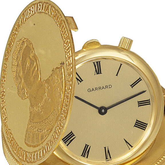 Swiss 18k gold keyless watch concealed in gold coin Circa 1980 Swiss 18k gold keyless watch concealed in gold coin Circa 1980