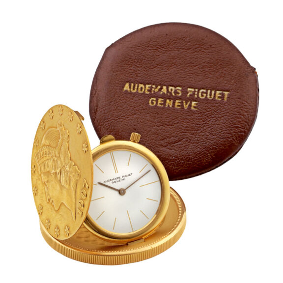 Swiss gold watch set in US 20 Dollar gold coin dated 1907 Circa 1960 Swiss gold watch set in US 20 Dollar gold coin dated 1907 Circa 1960