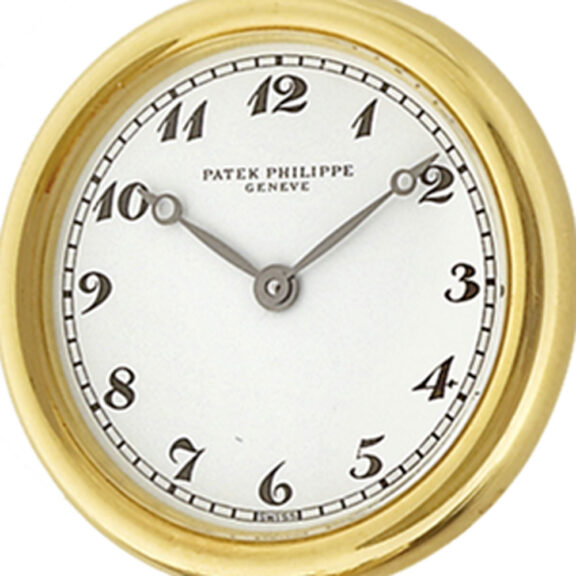 Swiss gold lapel quartz watch with chain and brooch Circa 1989 Swiss gold lapel quartz watch with chain and brooch Circa 1989