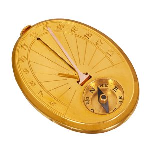 French gold oval dress watch with compass and sundial Circa 1938