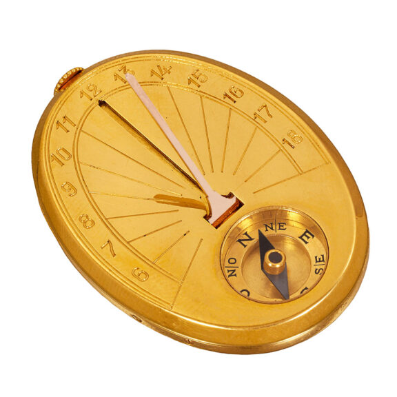 French gold oval dress watch with compass and sundial Circa 1938