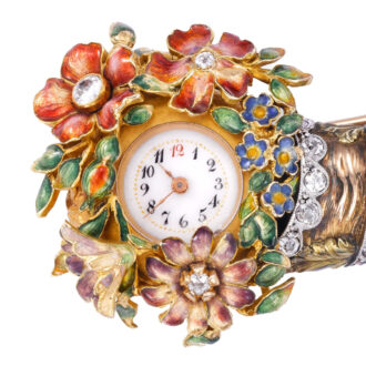 Swiss 18k gold brooch watch in the form of a cornucopia Circa 1910