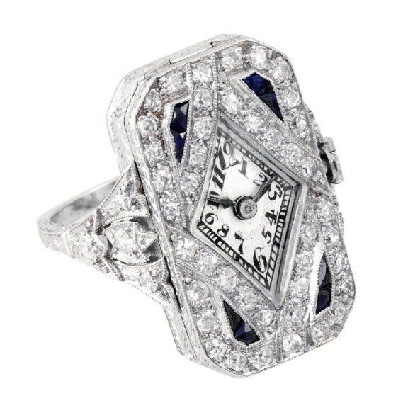 Swiss platinum diamond and sapphire ring watch Circa 1920 Swiss platinum diamond and sapphire ring watch Circa 1920