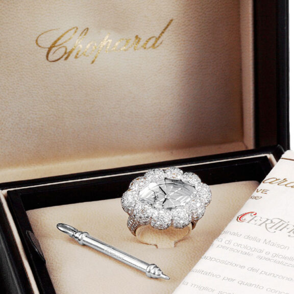 Swiss 18k white gold, diamond lady's ring watch Circa 2004 Swiss 18k white gold, diamond lady's ring watch Circa 2004