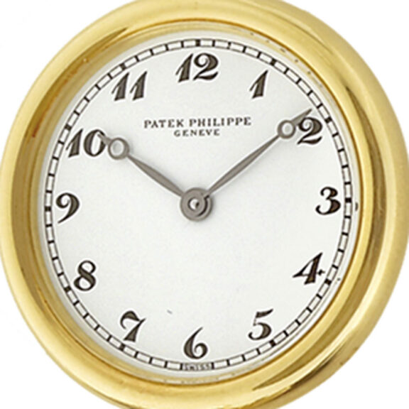 Swiss gold lapel quartz brooch watch with suede bow Circa 1989 Swiss gold lapel quartz brooch watch with suede bow Circa 1989