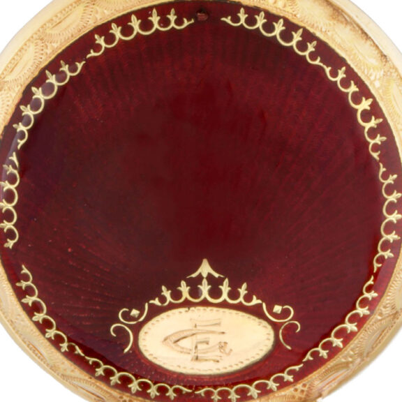 Swiss gold and red translucent enamel pendant watch Circa 1895 Swiss gold and red translucent enamel pendant watch Circa 1895