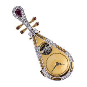 Unusual Swiss 18k gold pipa-shaped form watch Circa 1950