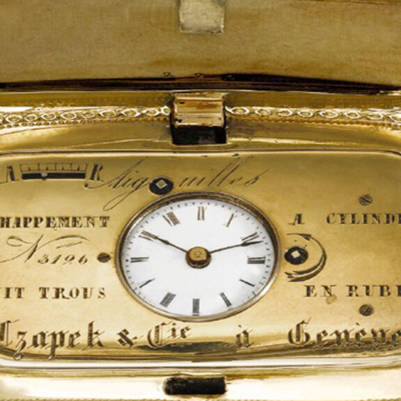 Swiss 18K gold, enamel and diamond set purse form watch Circa 1850 Swiss 18K gold, enamel and diamond set purse form watch Circa 1850