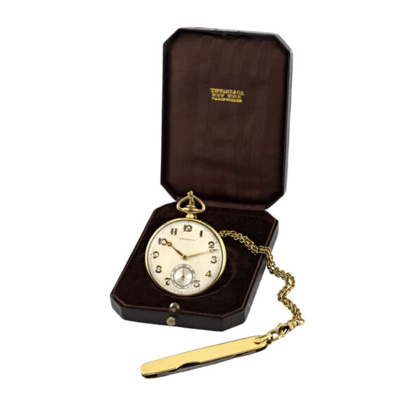 Swiss 14K gold watch accompanied by chain and knife Circa 1930 Swiss 14K gold watch accompanied by chain and knife Circa 1930