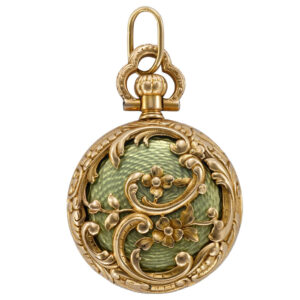 American 18K gold and enamel watch with repousse relief Circa 1900