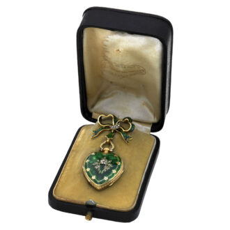 Swiss gold, enamel and diamond heart-shaped brooch watch Circa 1850 Swiss gold, enamel and diamond heart-shaped brooch watch Circa 1850