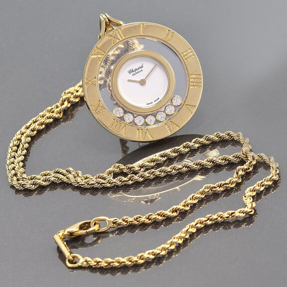 Swiss gold pendant watch with floating diamonds Circa 2000