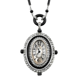 Swiss 18 Carat white gold tonneau shaped pendant watch Circa 1920