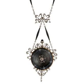 Charming Swiss platinum watch with matching chain Circa 1908