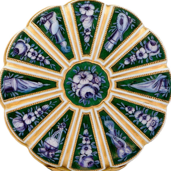 A very fine Swiss 18K gold and painted-on enamel pocket watch, circa 1820. Accompanied by a fitted wooden box. made for the Turkish market. A lobed case with twelve segments decorated with en grisaille painted on enamel flowers and trophies on a translucent red guilloche enamel ground, the bezel decorated to match, pendant and bow with pale green and white champleve enamel decoration. White enamel dial with radial Roman numerals, outer minute track and gold fancy hands. A rhodium-plated movement, 15 jewels, lateral lever escapement, notched bimetallic compensation balance, flat balance spring, and an index regulator. A very fine Swiss 18K gold and painted-on enamel pocket watch, circa 1820. Accompanied by a fitted wooden box. made for the Turkish market. A lobed case with twelve segments decorated with en grisaille painted on enamel flowers and trophies on a translucent red guilloche enamel ground, the bezel decorated to match, pendant and bow with pale green and white champleve enamel decoration. White enamel dial with radial Roman numerals, outer minute track and gold fancy hands. A rhodium-plated movement, 15 jewels, lateral lever escapement, notched bimetallic compensation balance, flat balance spring, and an index regulator.
