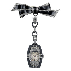 Swiss white gold Art-deco tonneau-shaped brooch watch Circa 1925