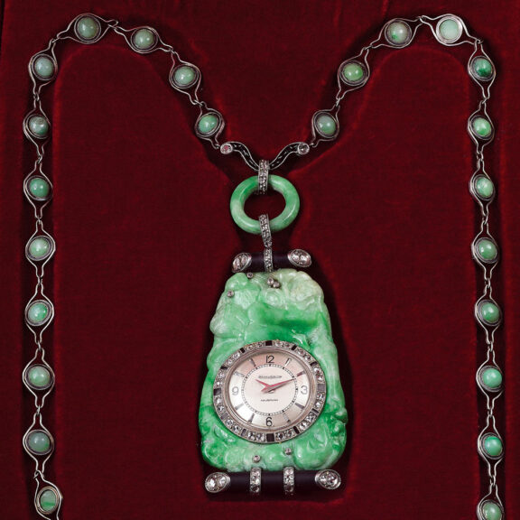Swiss white gold, jade, diamond and onyx pendant watch Circa 1960 Swiss white gold, jade, diamond and onyx pendant watch Circa 1960