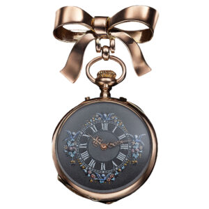 Elegant Swiss gold lapel watch with bow brooch Circa 1910