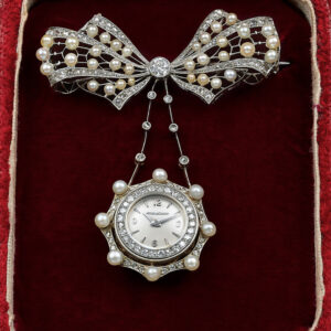 Elegant Swiss white gold, diamond and pearl lapel watch Circa 1960