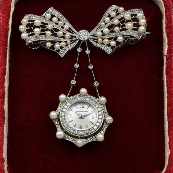 Elegant Swiss white gold, diamond and pearl lapel watch Circa 1960