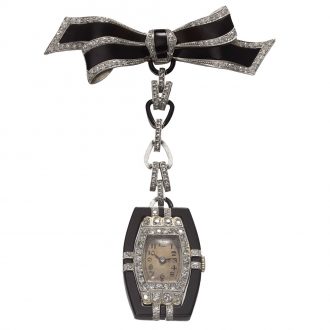 Swiss white gold Art-deco tonneau-shaped brooch watch Circa 1925