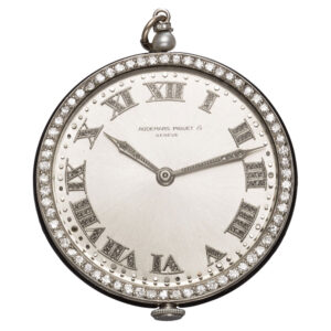 Charming Swiss platinum watch with long chain Circa 1920