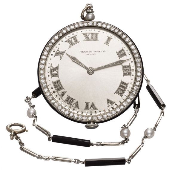 Charming Swiss platinum watch with long chain Circa 1920 Charming Swiss platinum watch with long chain Circa 1920