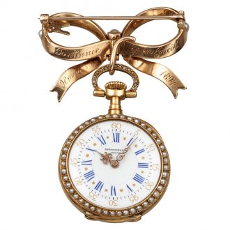 Elegant Swiss gold and pearl lapel brooch watch Circa 1894