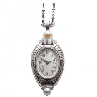 Swiss platinum Amphora-shaped Art Deco lapel watch Circa 1927