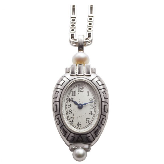 Swiss platinum Amphora-shaped Art Deco lapel watch Circa 1927